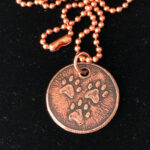 three paw copper charm