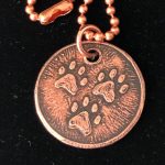 etched 3-paw copper charm