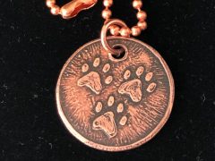 etched 3-paw copper charm