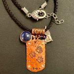 3-paw dog tag charm on nylon cord