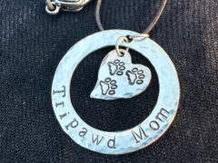 Tripawd Mom sterling silver 3-paw heart necklace and 20" cotton cord.