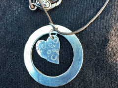 Tripawd Mom sterling silver 3-paw heart necklace and 20" cotton cord.